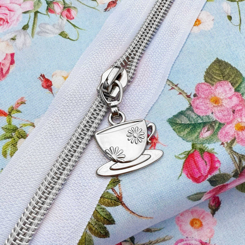 Nickel Tea Cup and Saucer for